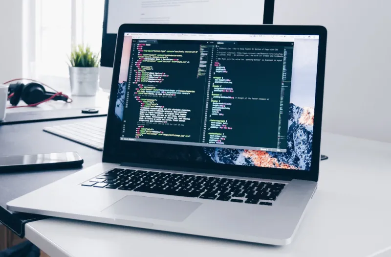 a-laptop-with-code-on a-laptop-with-code-on