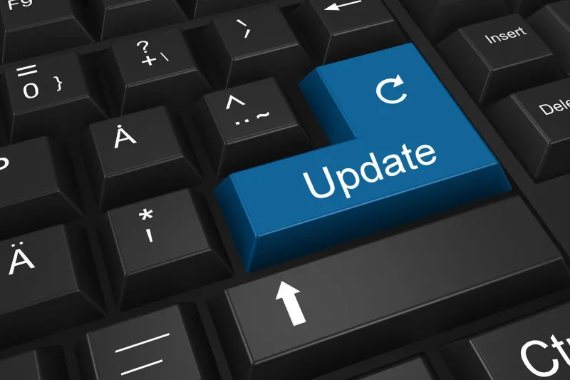 black keyboard with white letters and a blue button labelled update black keyboard with white letters and a blue button labelled update