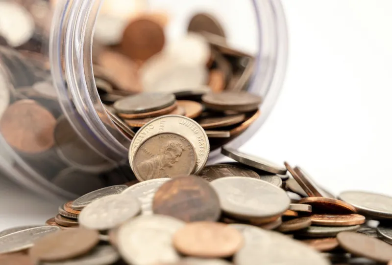 coins-spilling-out-jar