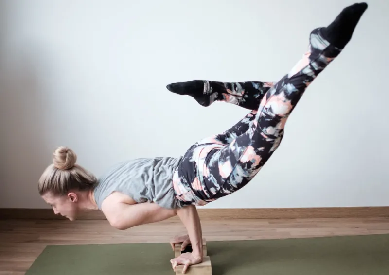 gymnast-balancing-on-bar