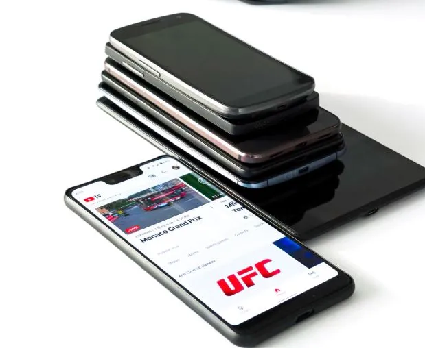 Different mobile devices stacked on top of each other