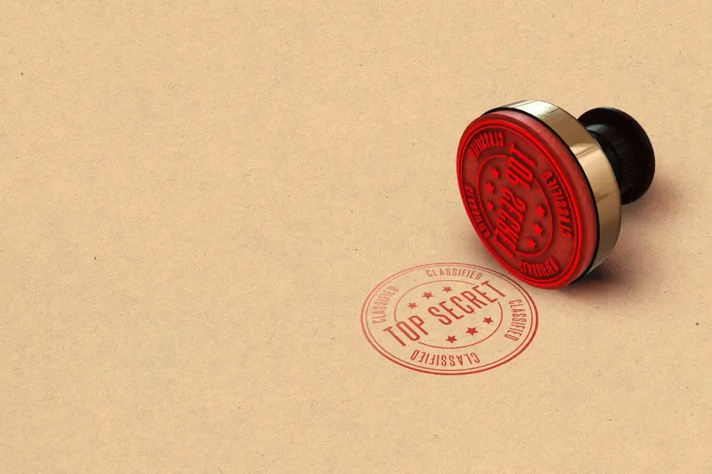 folder with a top secret stamp mark in red 