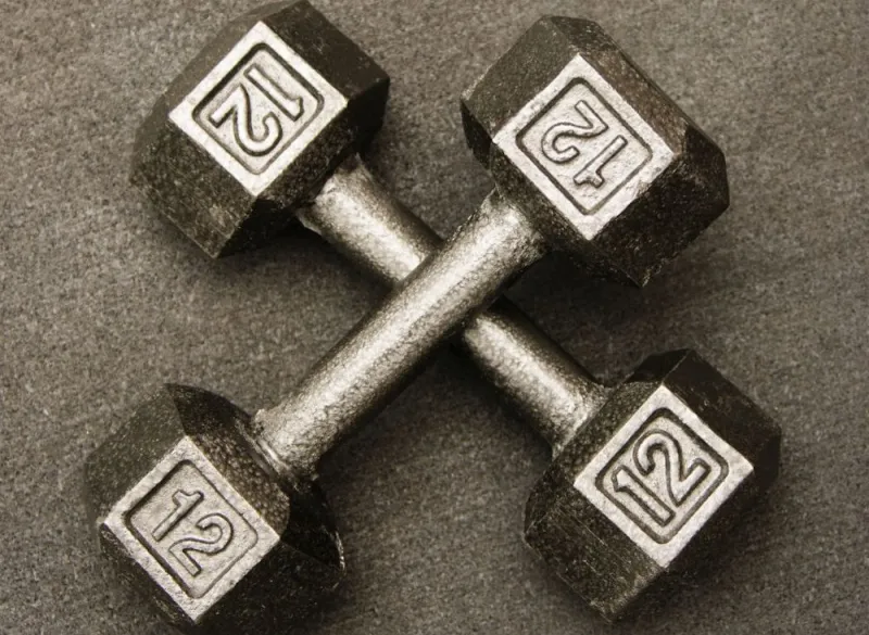 two-dumbbells-crossing-over-each-other