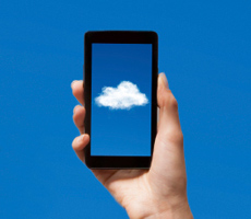 holding a smartphone cloud app