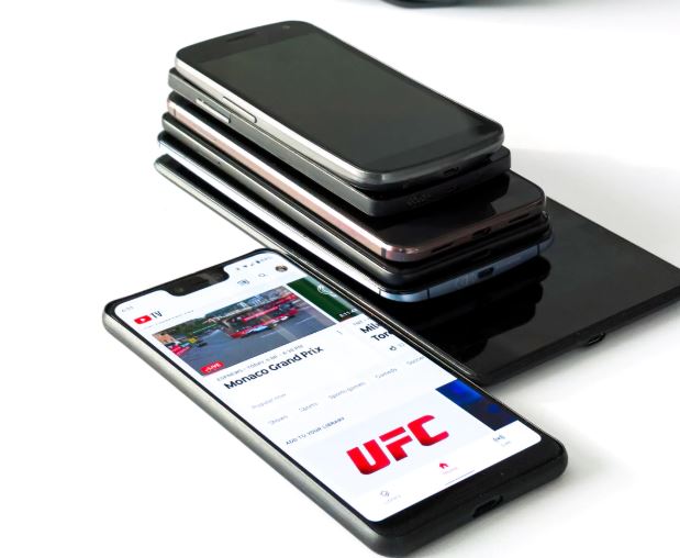 Different mobile devices stacked on top of each other